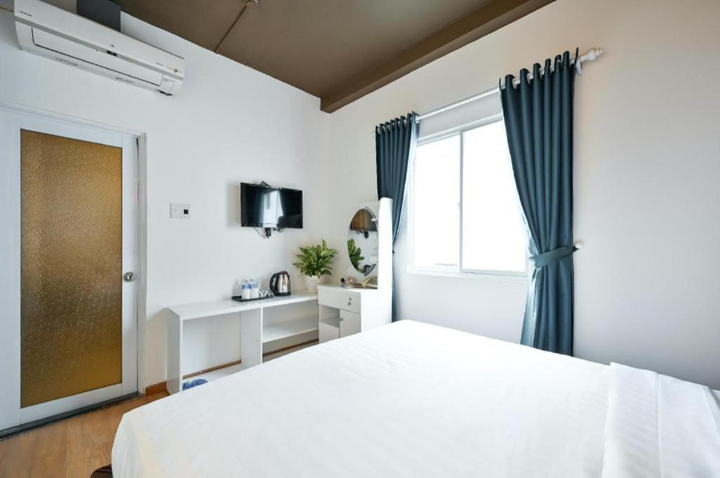 The Noble Swan Wood Park Hotel Ho Şi Min Exterior foto