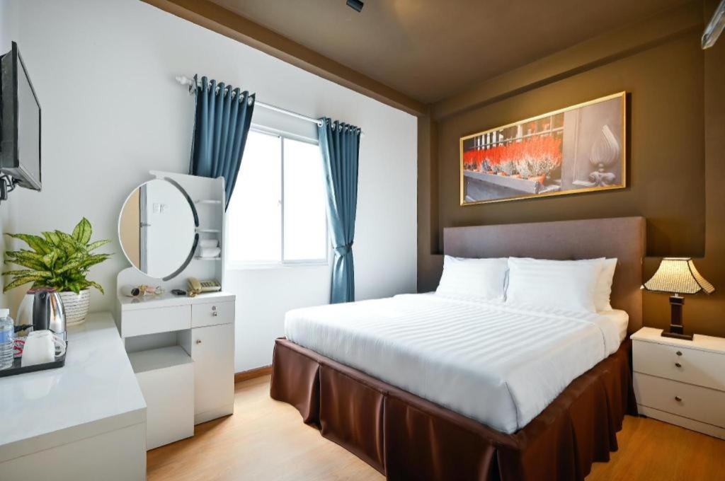 The Noble Swan Wood Park Hotel Ho Şi Min Exterior foto
