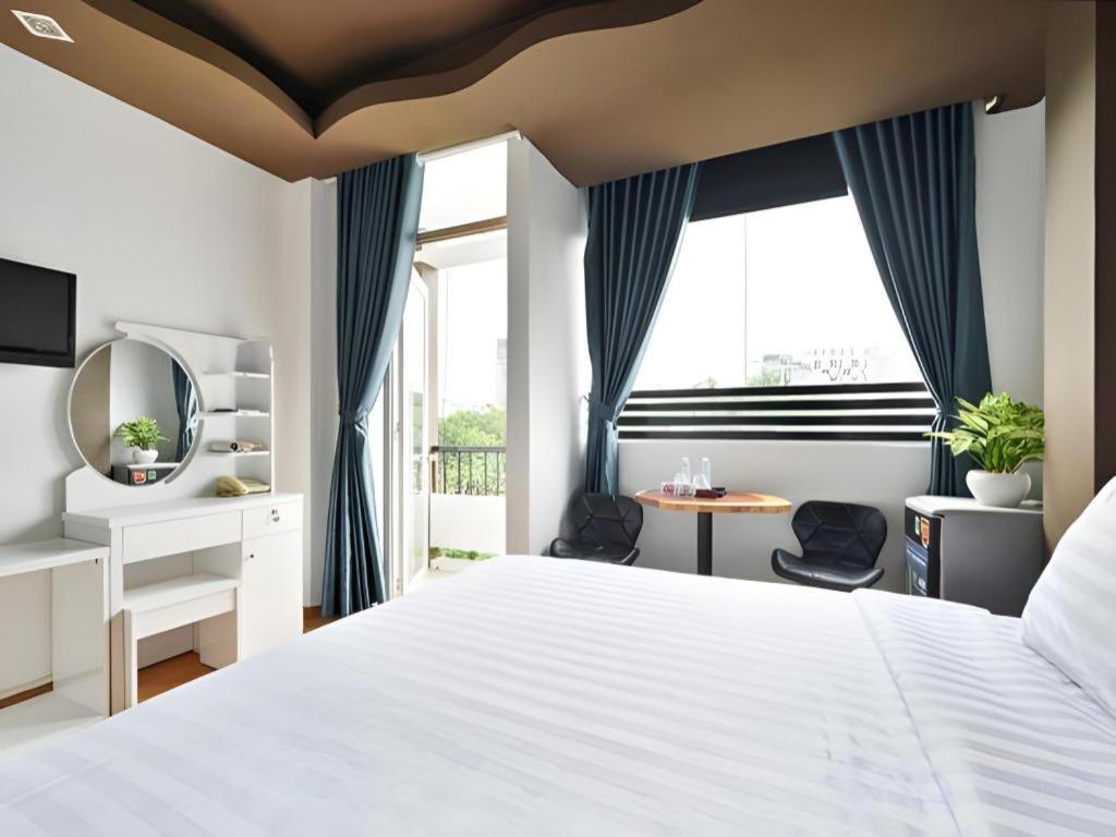 The Noble Swan Wood Park Hotel Ho Şi Min Exterior foto