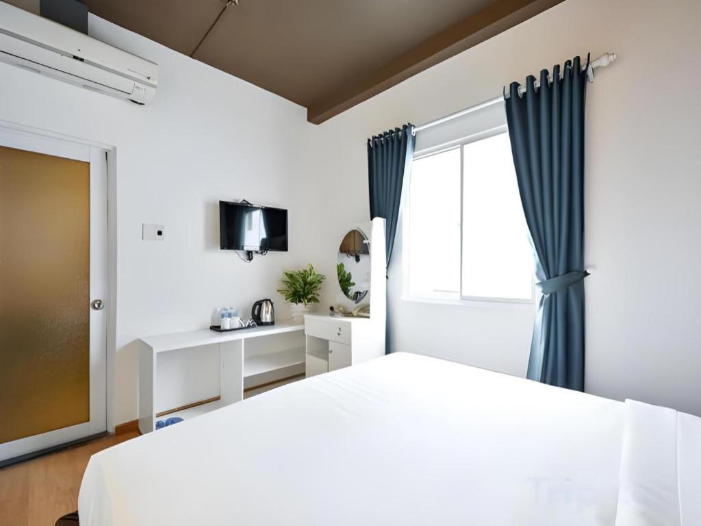 The Noble Swan Wood Park Hotel Ho Şi Min Exterior foto